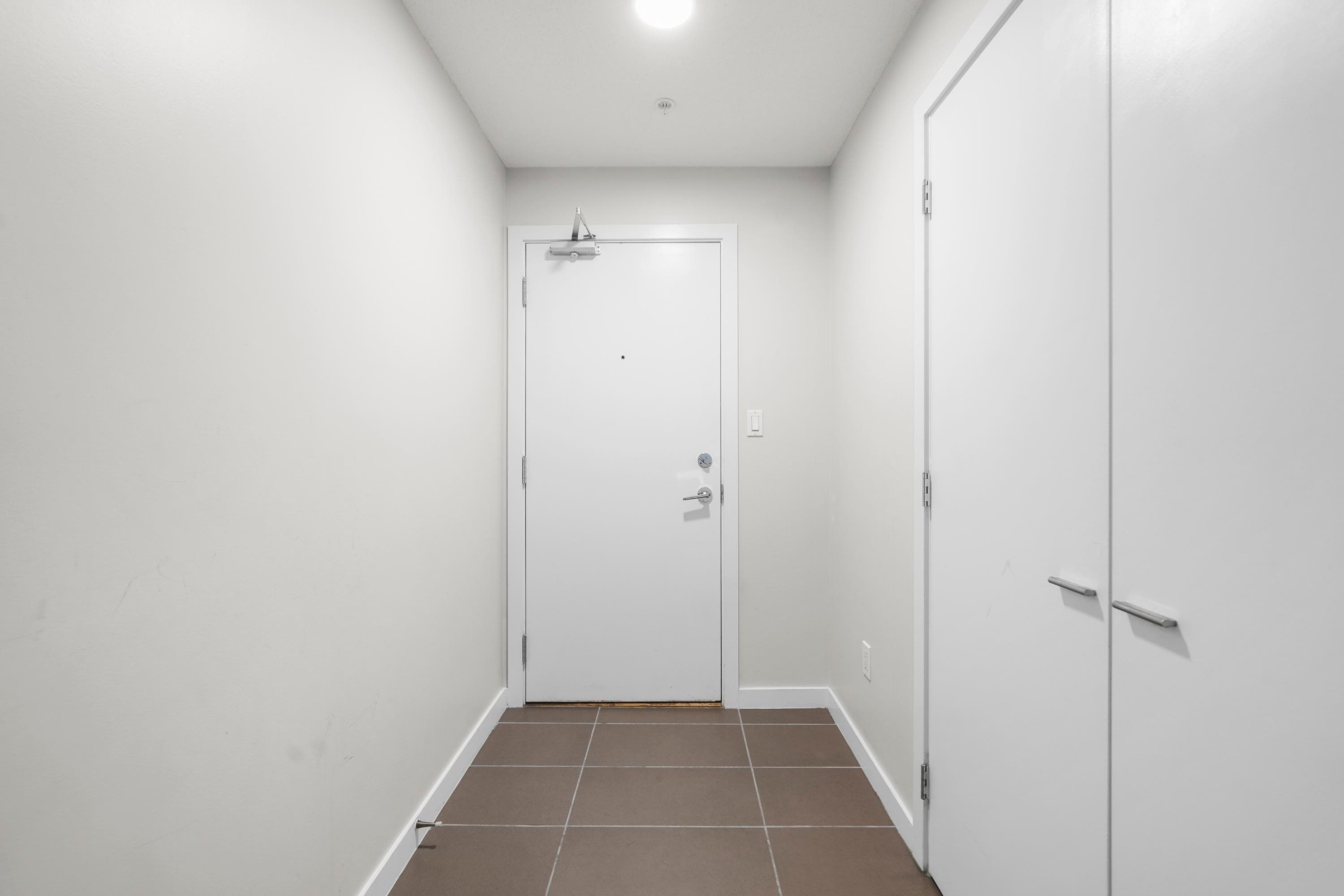 1402 - 2979 Glen Drive, Coquitlam, V3B 0B2 — photo 3