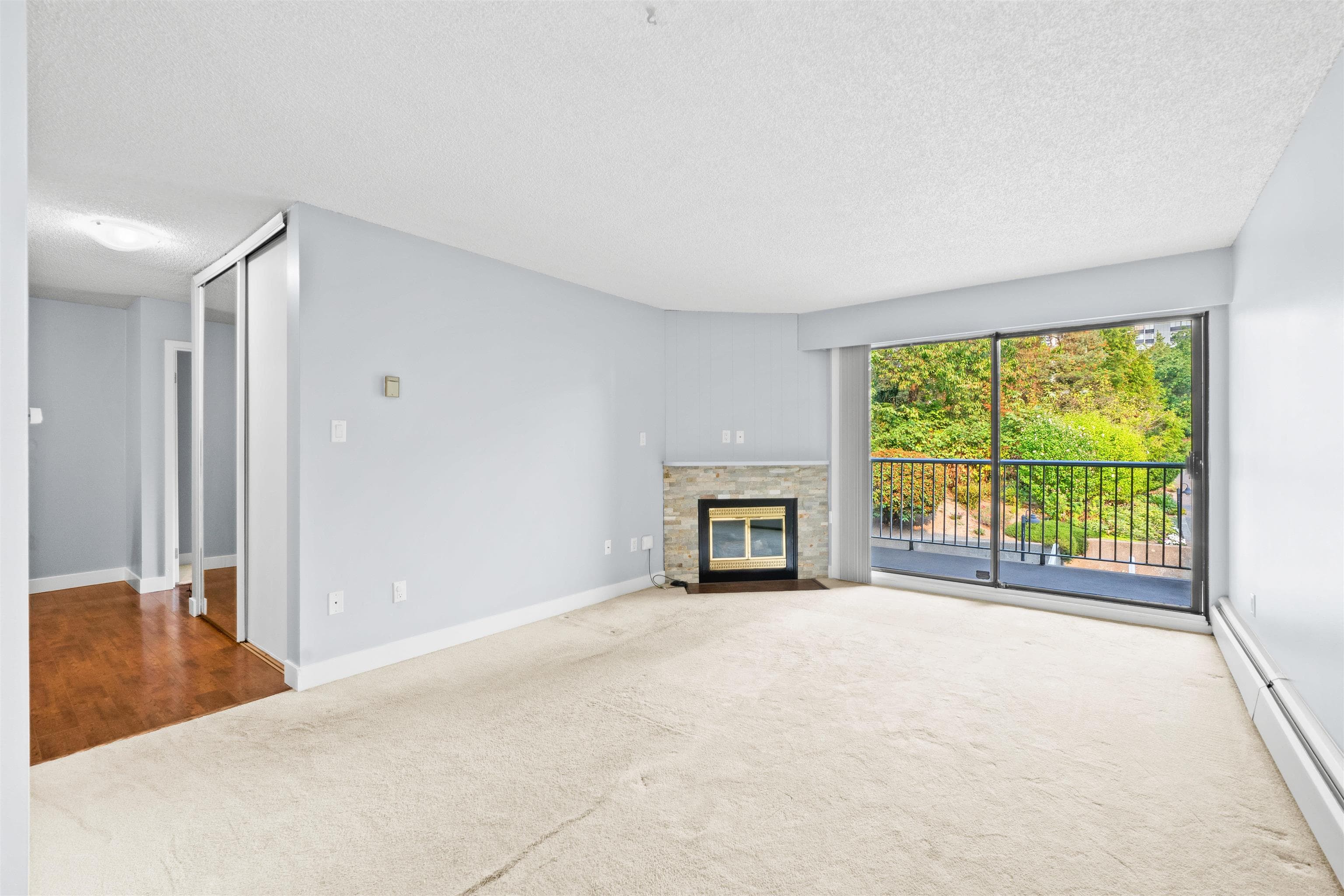 201 - 3901 Carrigan Court, Burnaby, V3N 4K1 — photo 3