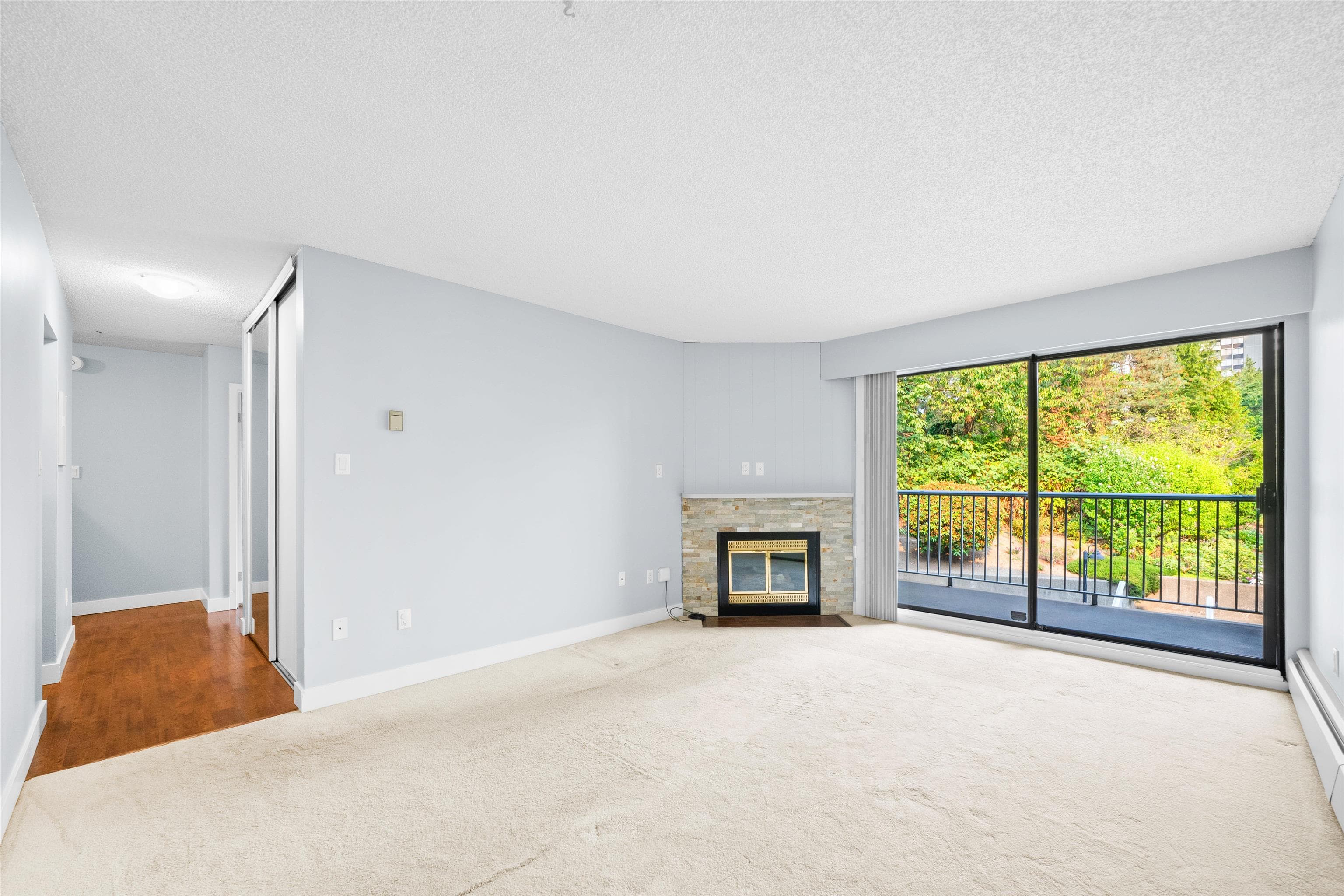 201 - 3901 Carrigan Court, Burnaby, V3N 4K1 — photo 1