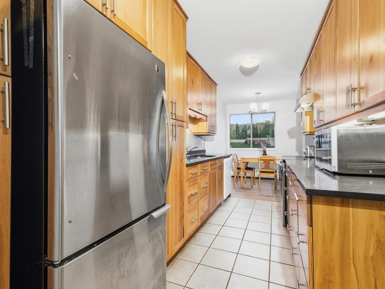 312 - 3901 Carrigan Court, Burnaby, V3N 4K1 — photo 5