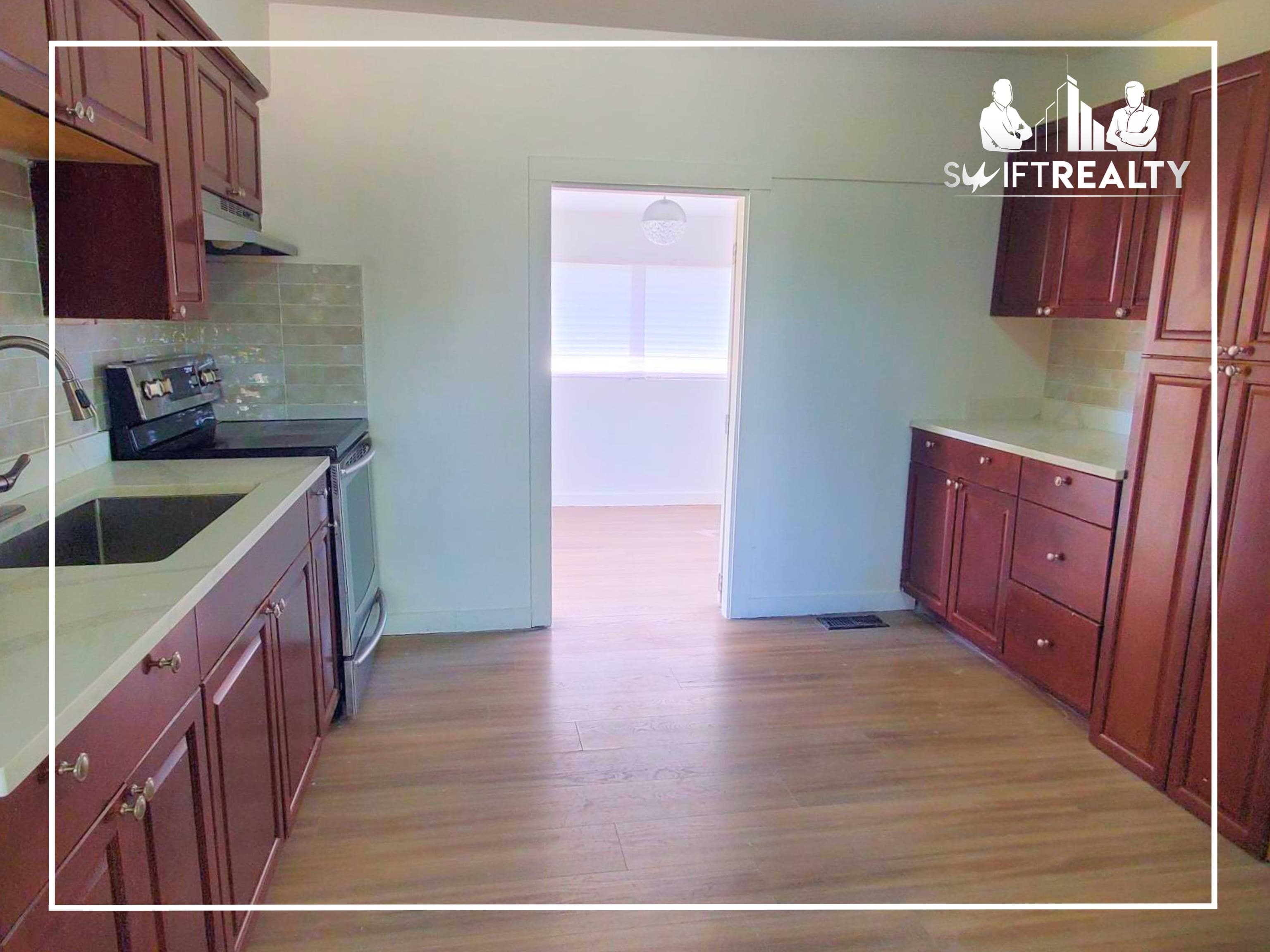 Main Level - 7429 Canada Way, Burnaby, V3N 3J7 — photo 4