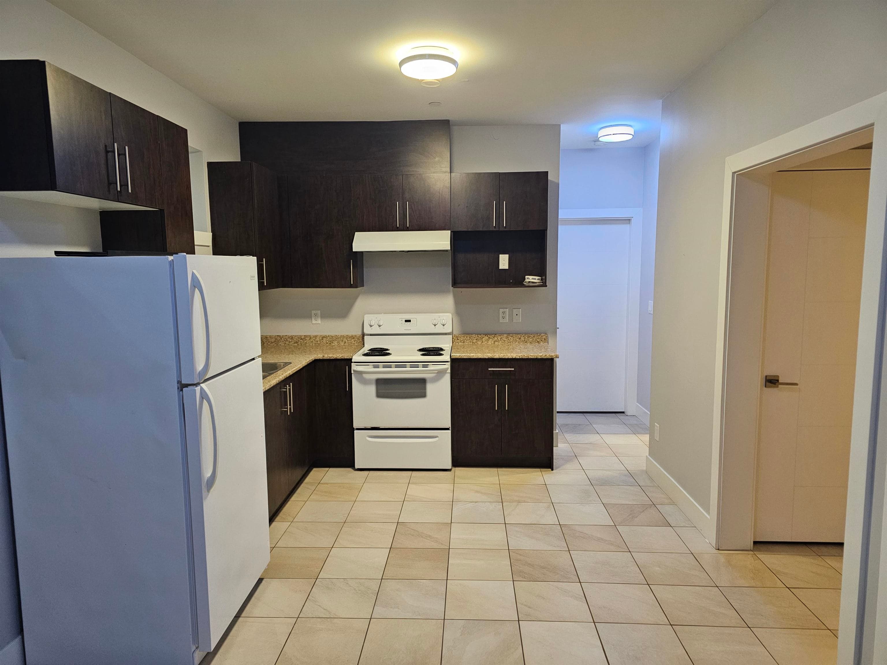 Lower - 3128 East 45th Avenue, Vancouver, V5R 3E1 — photo 2