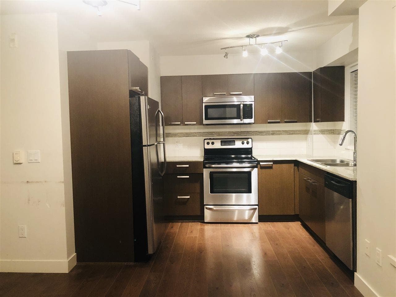 717 - 13883 Laurel Drive, Surrey, V3T 1A8 — photo 2
