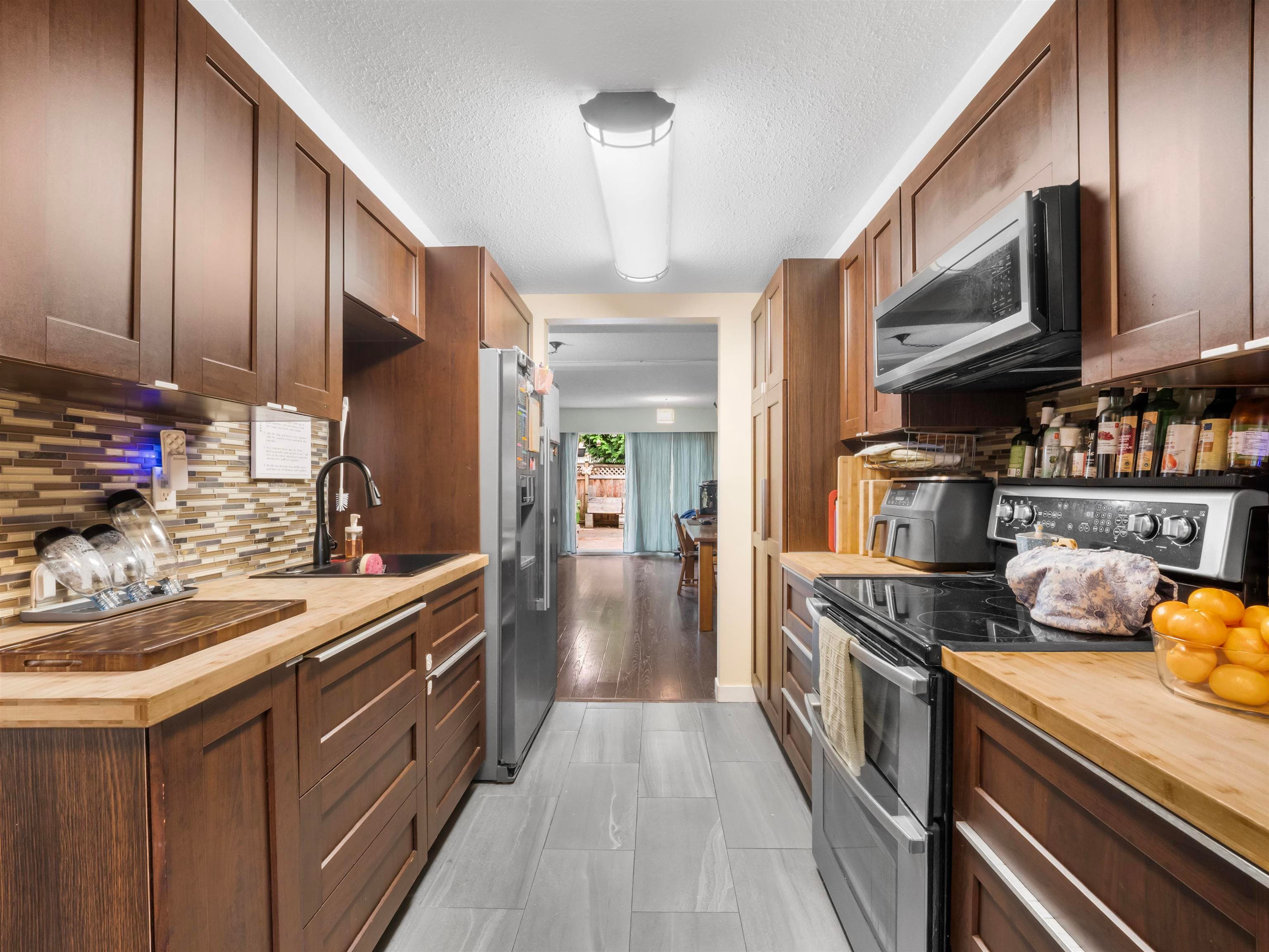 132 - 7476 138 Street, Surrey, V3W 6G4 — photo 1