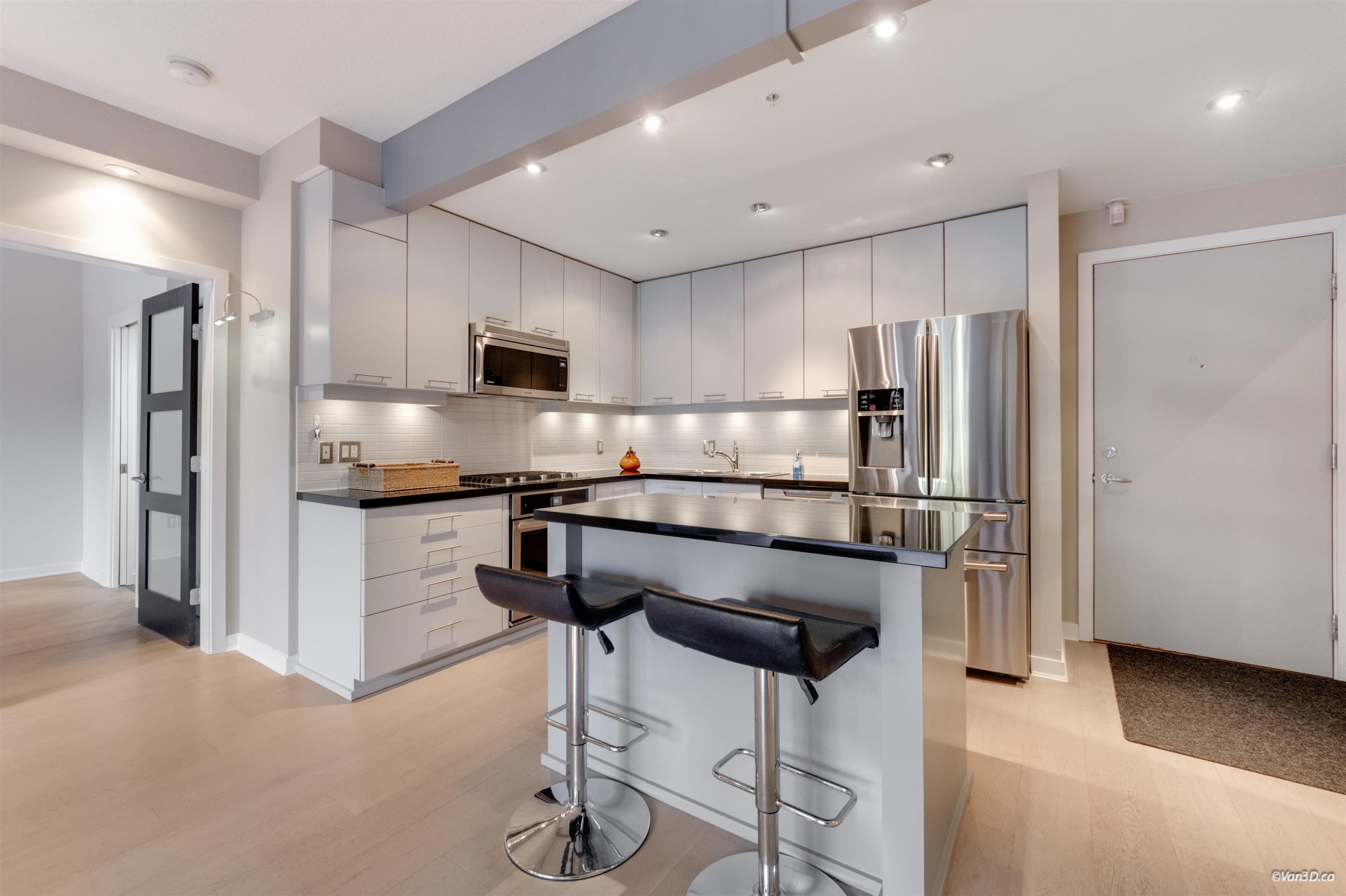 210 - 530 Raven Woods Drive, North Vancouver, V7G 2T5 — photo 1