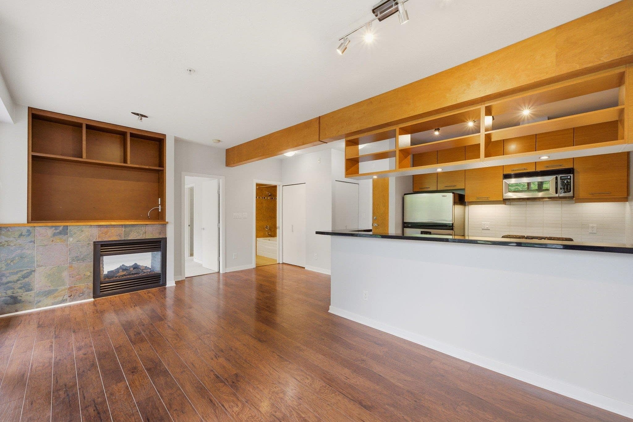 318 - 560 Raven Woods Drive, North Vancouver, V7G 2T3 — photo 1